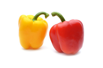 Colored peppers on white background