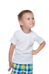 Little boy in a white shirt imagines