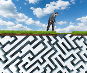 Businessman looks at the underground plastic maze