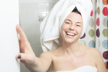 Shower woman. Happy smiling woman washing shoulder showering in