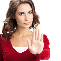 Serious woman with stop gesture, on white