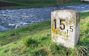 Old Milestone at the river