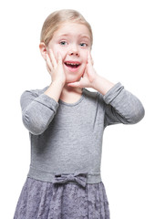 Beautiful little girl with blond hair surprised isolated