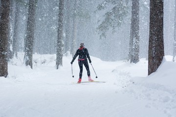 Cross country skiing in bad weather.