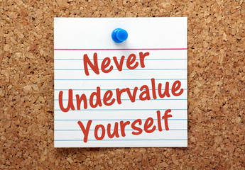 Never Undervalue Yourself reminder on a notice board