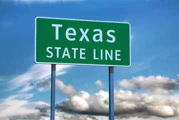 Poster Im Rahmen Texas state line sign © andreykr
