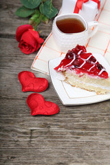 Cup of tea, piece of cake and red heart