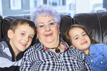 Portrait of smiling multigeneration family spending leisure time