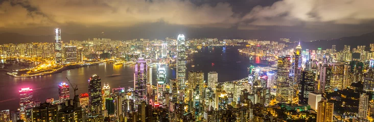 Fotobehang De skyline van Hong Kong vanaf The Peak © AlexQ