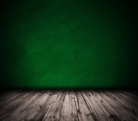 Green wall and wooden floor interior background