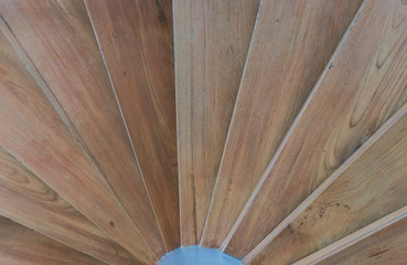close up of circular wood staircase