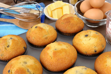 Baking making cooking muffin cup cake ingredients with fresh muffins photo