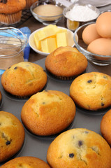 Baking making cooking muffin cup cake ingredients with fresh muffins photo