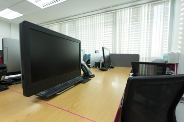 table work in office with black computer pc