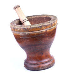 wooden mortar and pestle isolated on white background