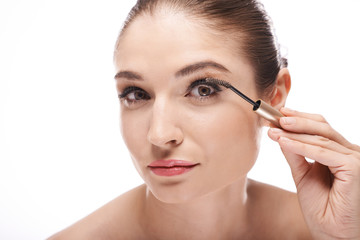 Fototapeta premium Applying mascara