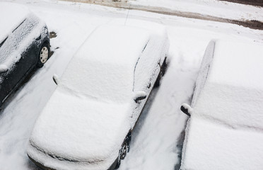 top view of car cover after snowfall. snow surface