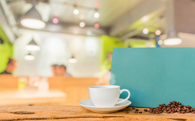 Obraz na płótnie Canvas Coffee shop blur background with bokeh image.