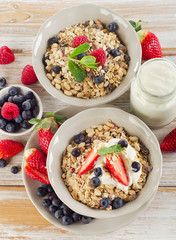 Muesli,  fresh berries and yogurt for healthy breakfast