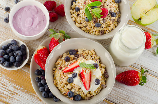 Muesli,  fresh berries and yogurt for  breakfast