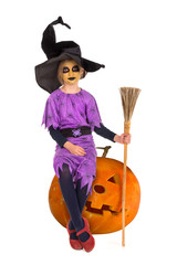 Young girl witch in Halloween