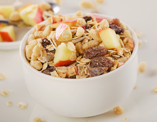Healthy muesli breakfast with apple