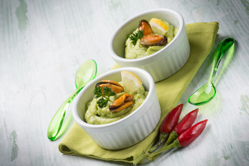 avocado cream with mussel appetizer