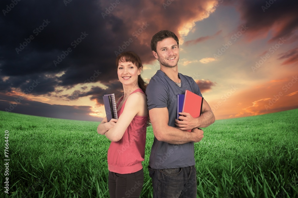 Poster Composite image of two students both with notepads