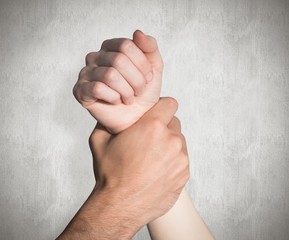 Composite image of womans wrist held by man - obrazy, fototapety, plakaty