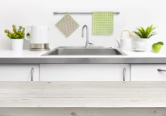 Stoff pro Meter Wooden table on kitchen sink interior background © didecs