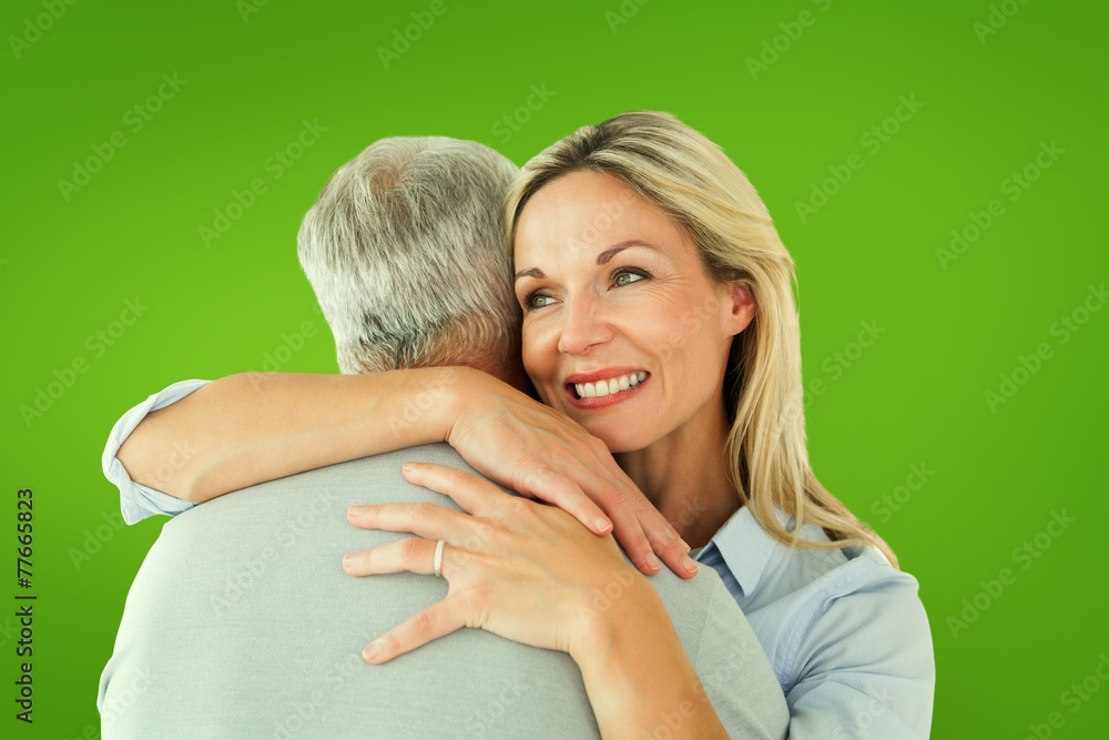Poster composite image of happy couple standing and hugging