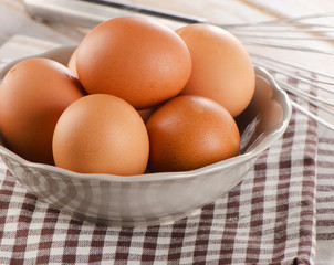 Fresh  brown eggs in a bowl
