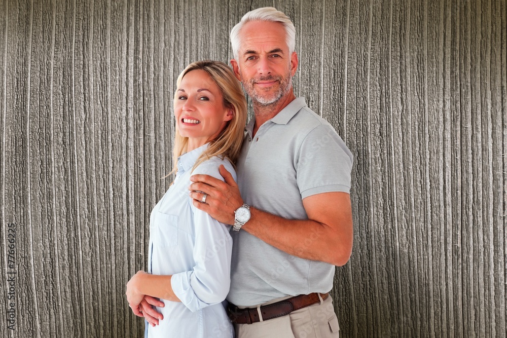 Poster composite image of happy couple smiling at camera