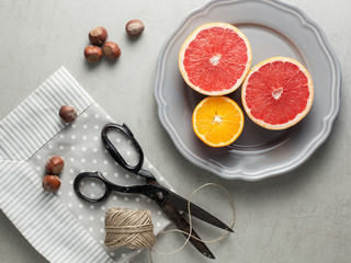 citrus fruit and hazelnuts as snack