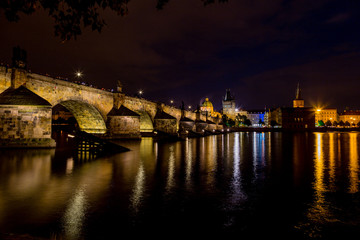 Fototapeta na wymiar Night view of Charles Bridge and Vltava