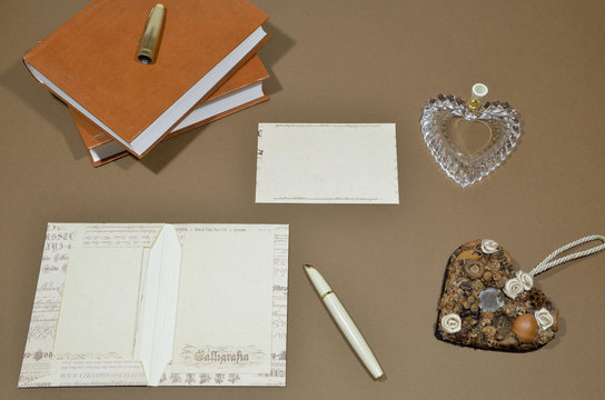 Writing a letter, hearts and books