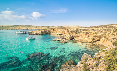 The world famous Blue Lagoon in Comino island of Malta - obrazy, fototapety, plakaty