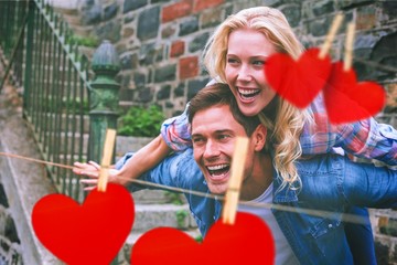 Composite image of hip young couple having fun