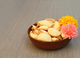 thai dessert in bowl with artificial flower