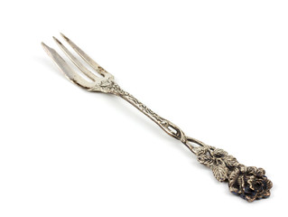 Retro silver fork isolated on white background