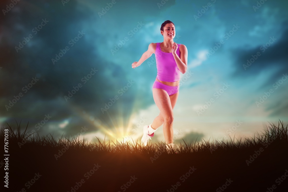 Poster Composite image of fit brunette running and jumping
