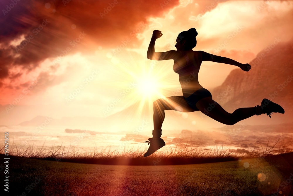 Aufkleber Composite image of fit brunette running and jumping