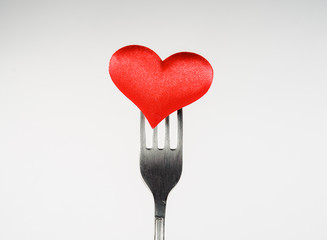 heart impaled on a fork