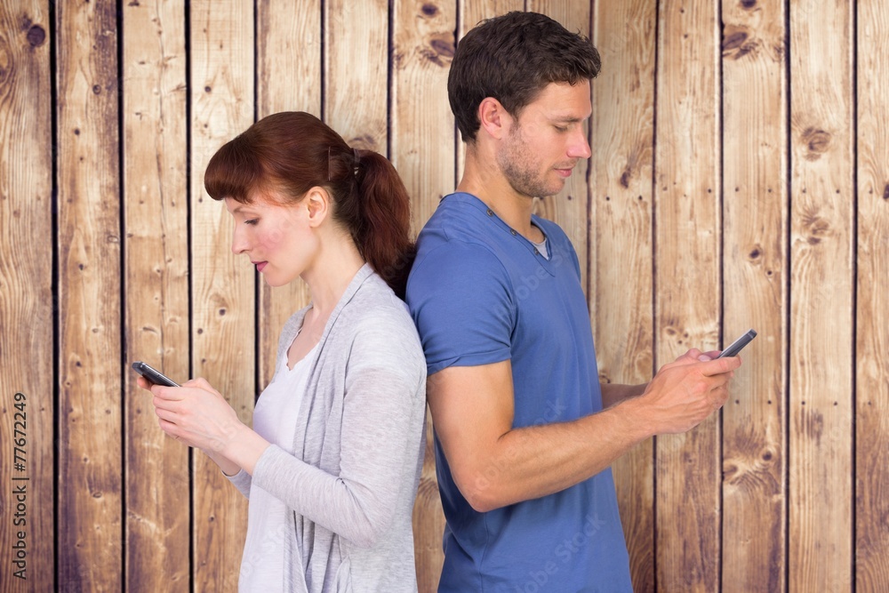 Aufkleber Composite image of couple both sending text messages