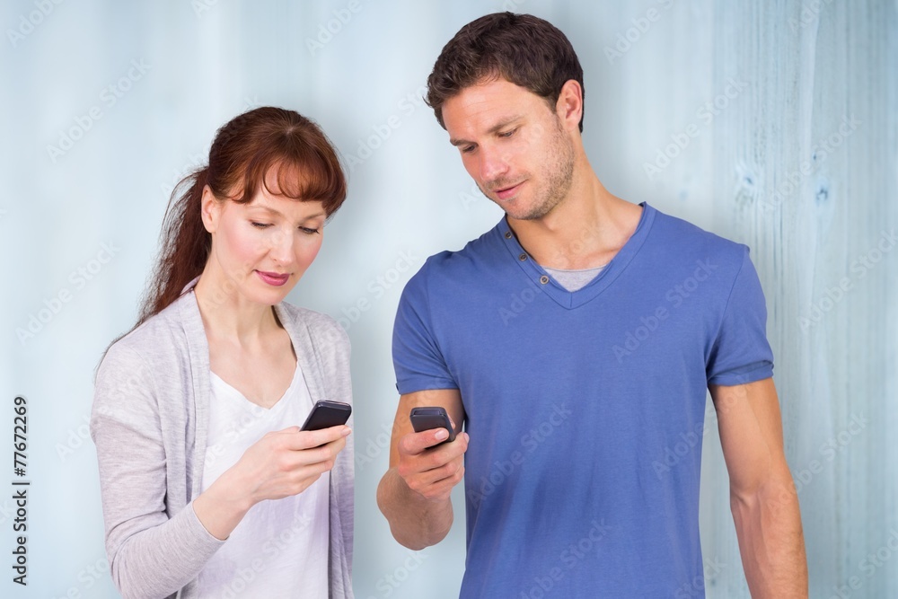 Poster composite image of couple using their mobile phones