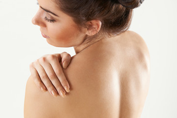 Naklejka premium Studio Shot Of Woman With Painful Shoulder