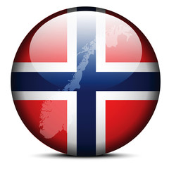 Fototapeta premium Map on flag button of Kingdom of Norway