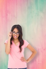 Fototapeta premium Composite image of pretty brunette thinking