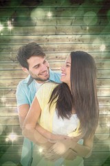 Composite image of happy casual couple smiling at each other