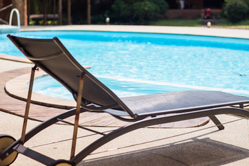 Fototapeta premium Swimming pool with beach chairs